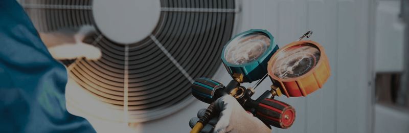 Technician performing furnace repair Phoenix service in a Phoenix AZ home